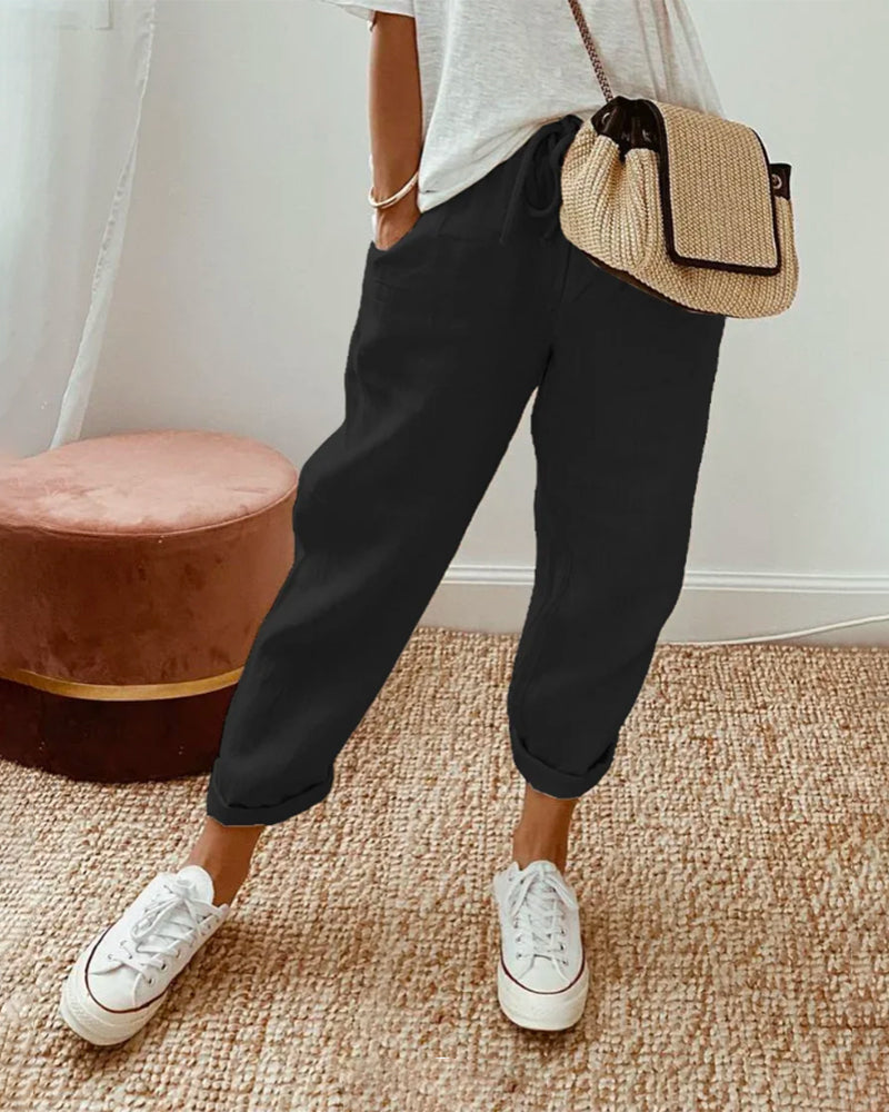 Pantalones de lino transpirables ALBI - puesto en modelo