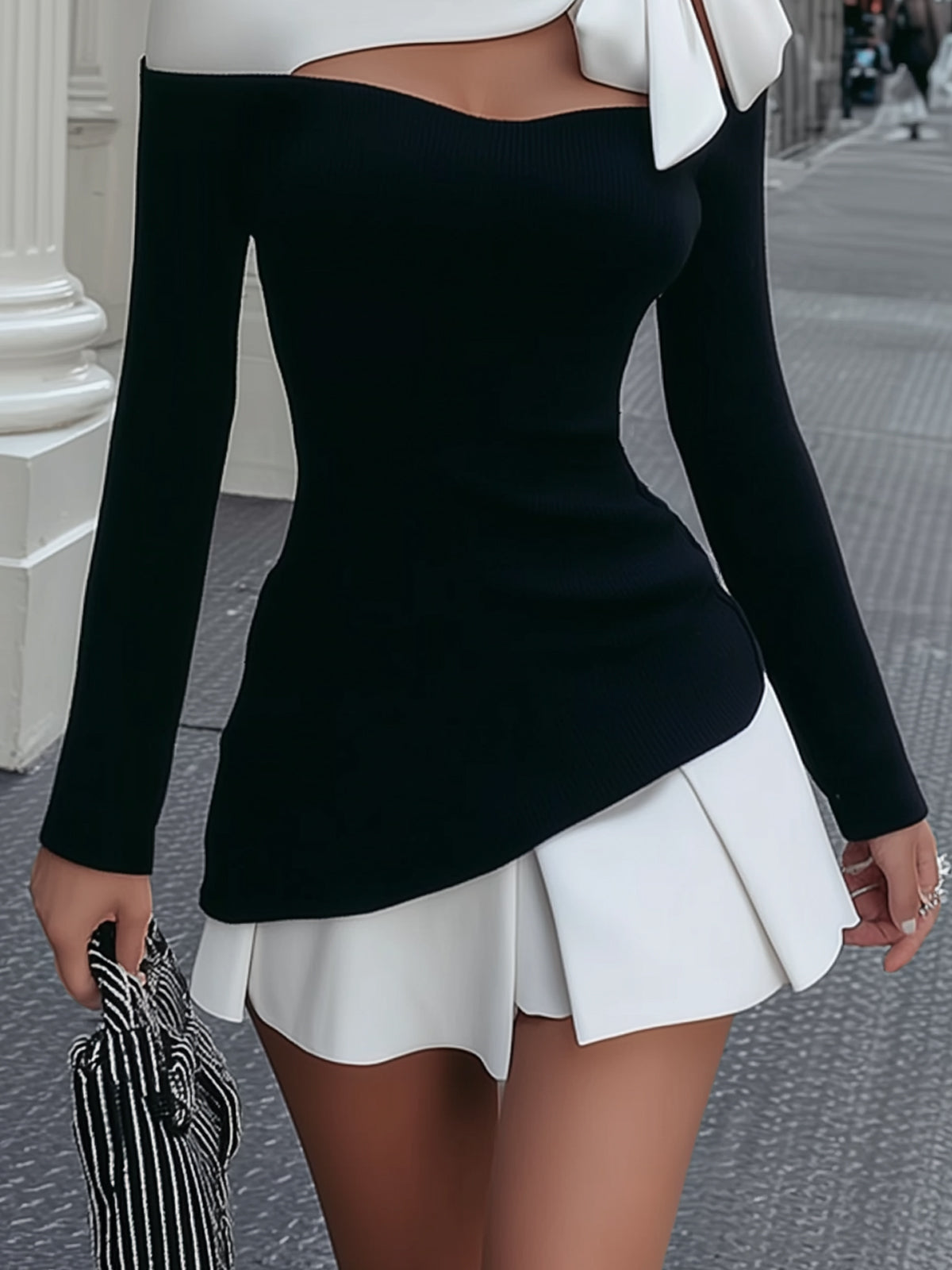 ALBI | Minivestido con tirantes y lazo cosido en blanco y negro