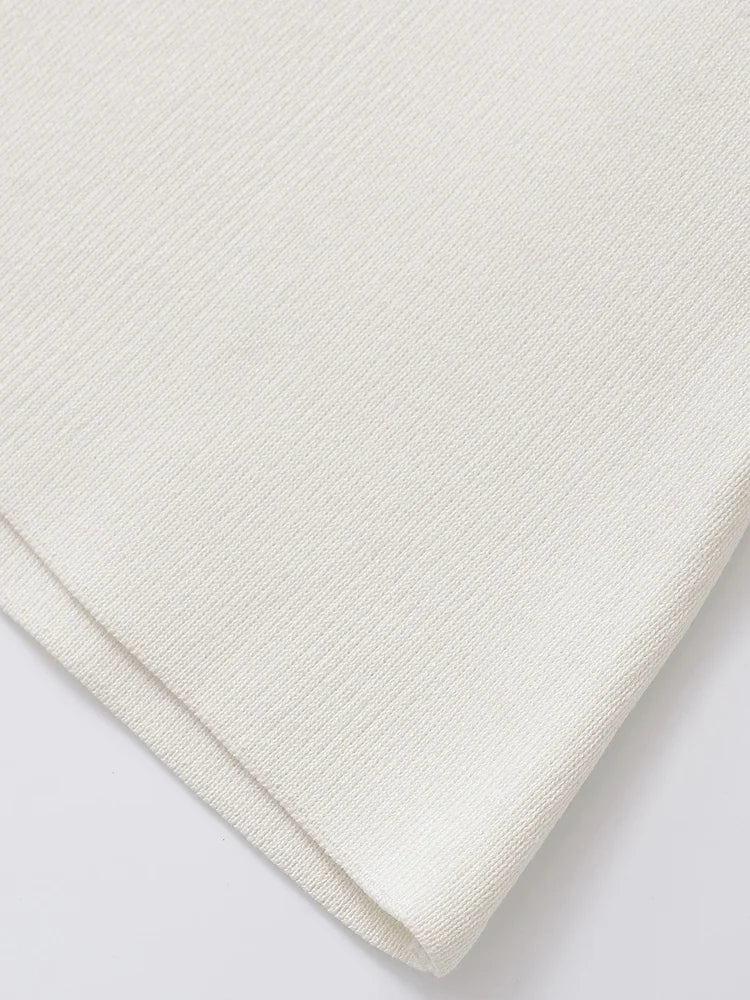Blusa minimalista y elegante con cierre de botones ALBI - Blusas - imagen 9
