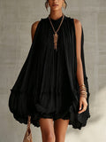 ALBI | Vestido mini burbuja de chifón negro con cuello halter y volantes