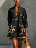 ALBI | Vestido mini de encaje de crochet con estampado en negro y dorado y escote en V