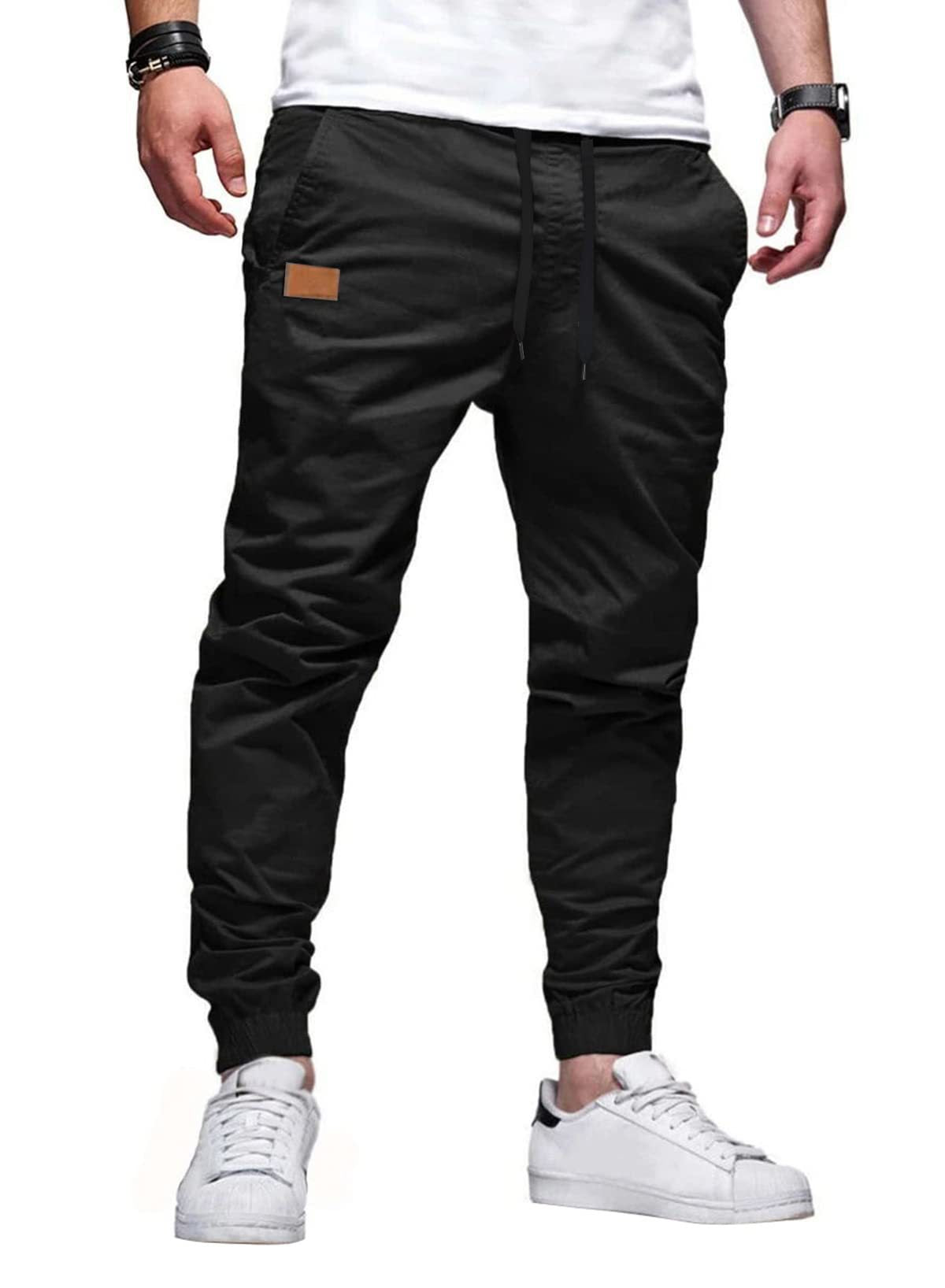 Pantalones casuales rectos con tejido elástico ALBI - color negro - foto principal